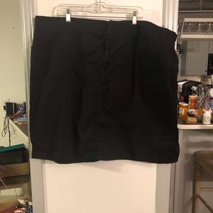 Black knee skirt. Button front